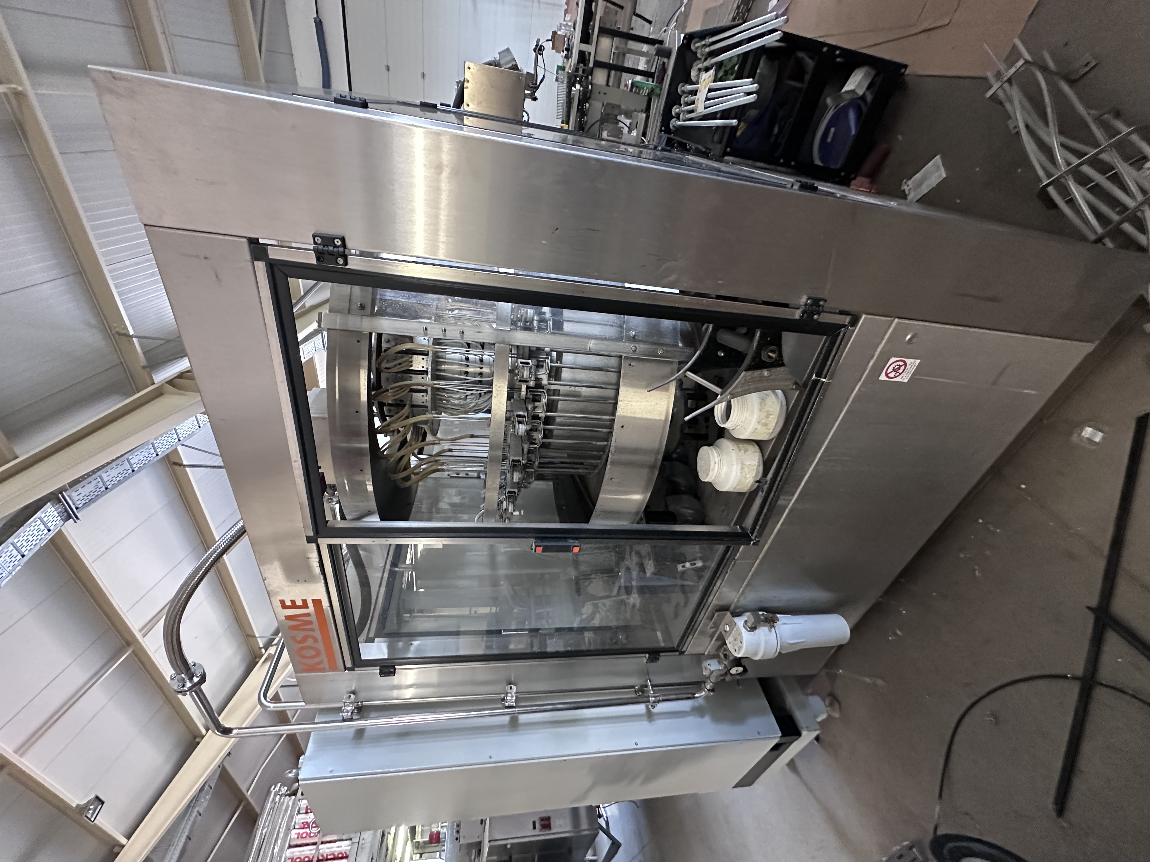 Machine de remplissage de bouteilles rotative KOSME