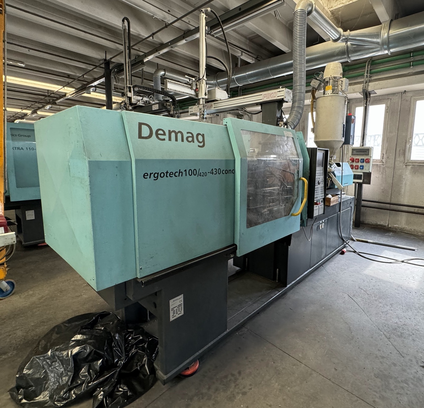Presse à injecter DEMAG 1000/420-430 ERGOTECH CONCEPT