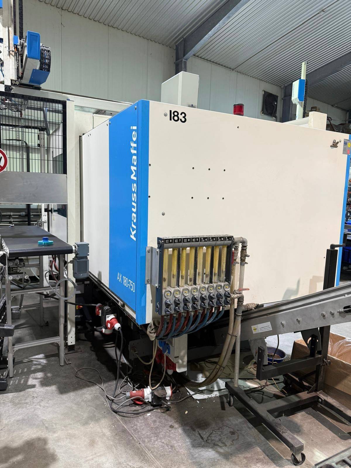 Presse à injecter KRAUSS MAFFEI KM180-750 AX