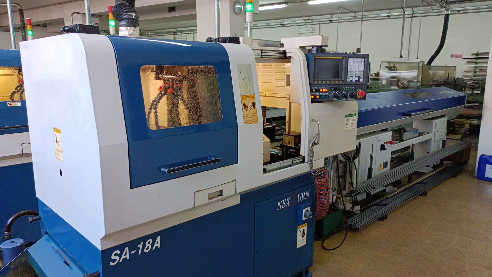 Tour CNC à poupée mobile Nexturn SA 18A d'occasion