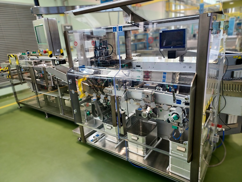 Marchesini MA100 - Cartonneuse à mouvement alternatif pour flacons standards et flacons avec bouchon ophtalmique
