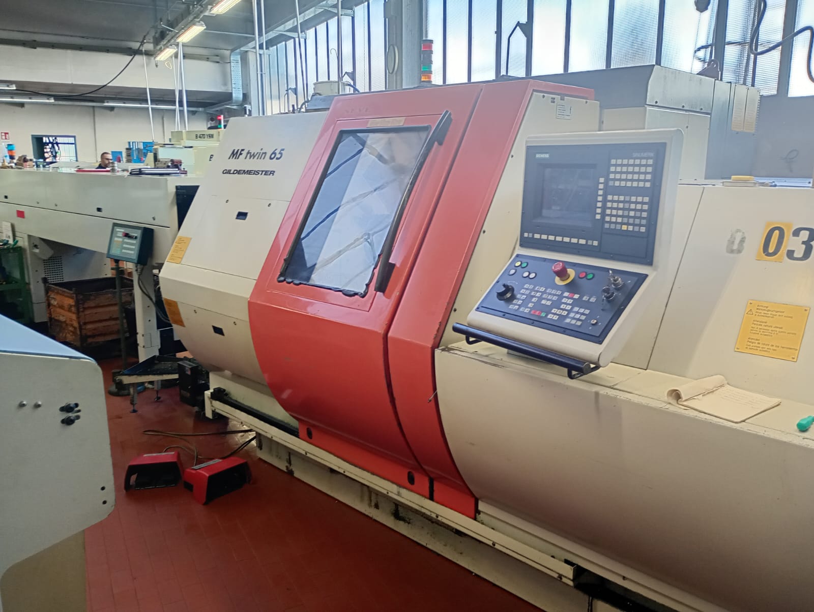 Tour CNC avec ravitailleur de barres GILDEMEISTER MF TWIN 65 d'occasion
