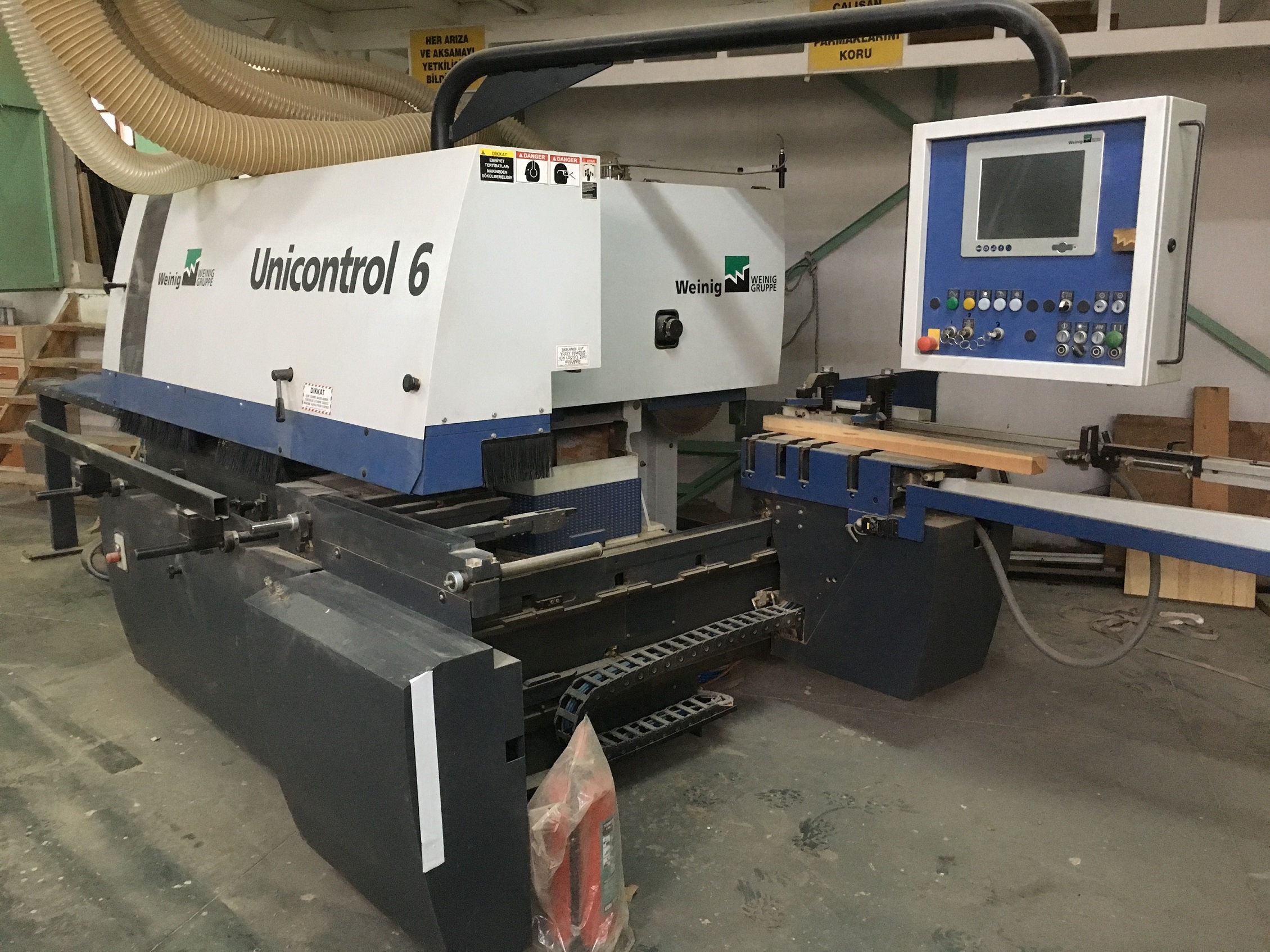 Centre d'usinage CNC Weinig Unicontrol 06 PC Wood (jeu de lames de 68 mm et 78 mm inclus)