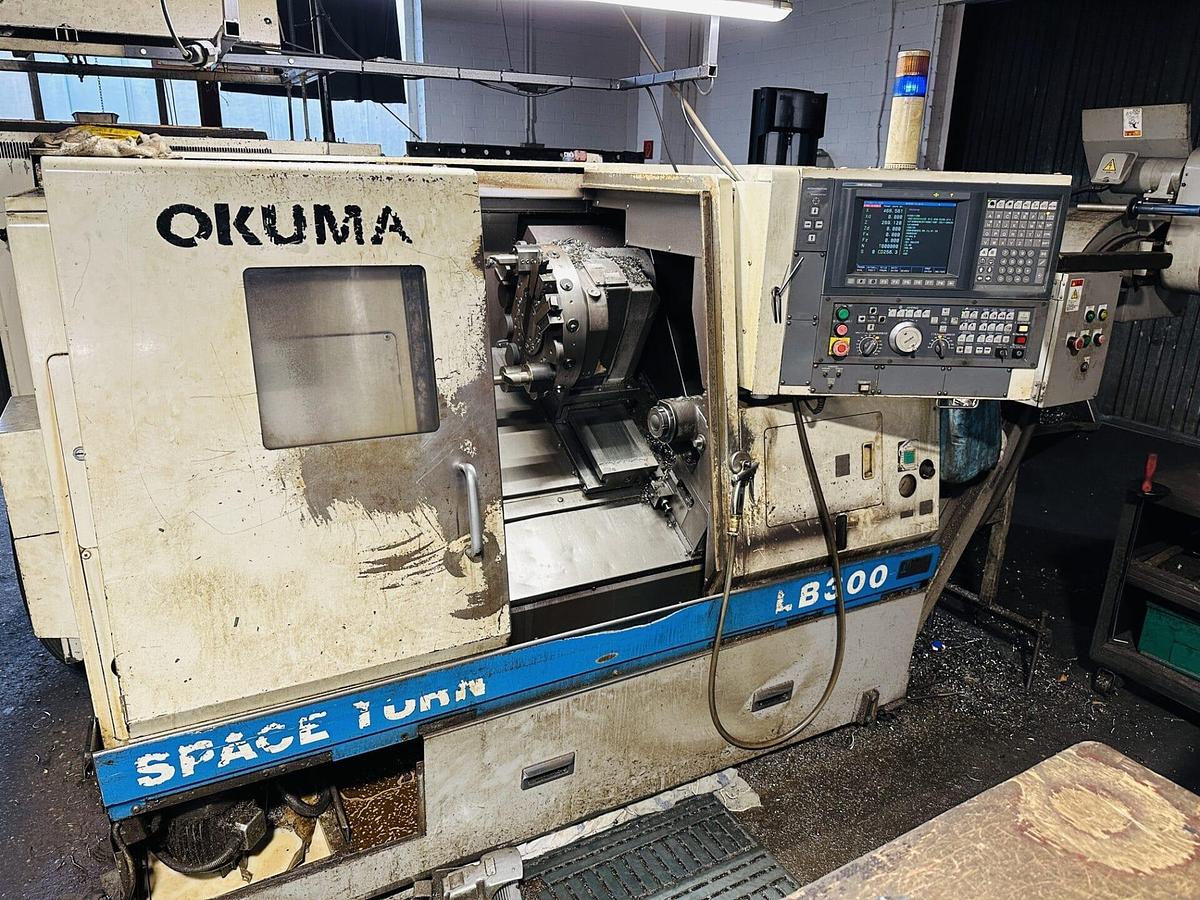 Tour cnc avec outils fixes OKUMA LB300 d'occasion