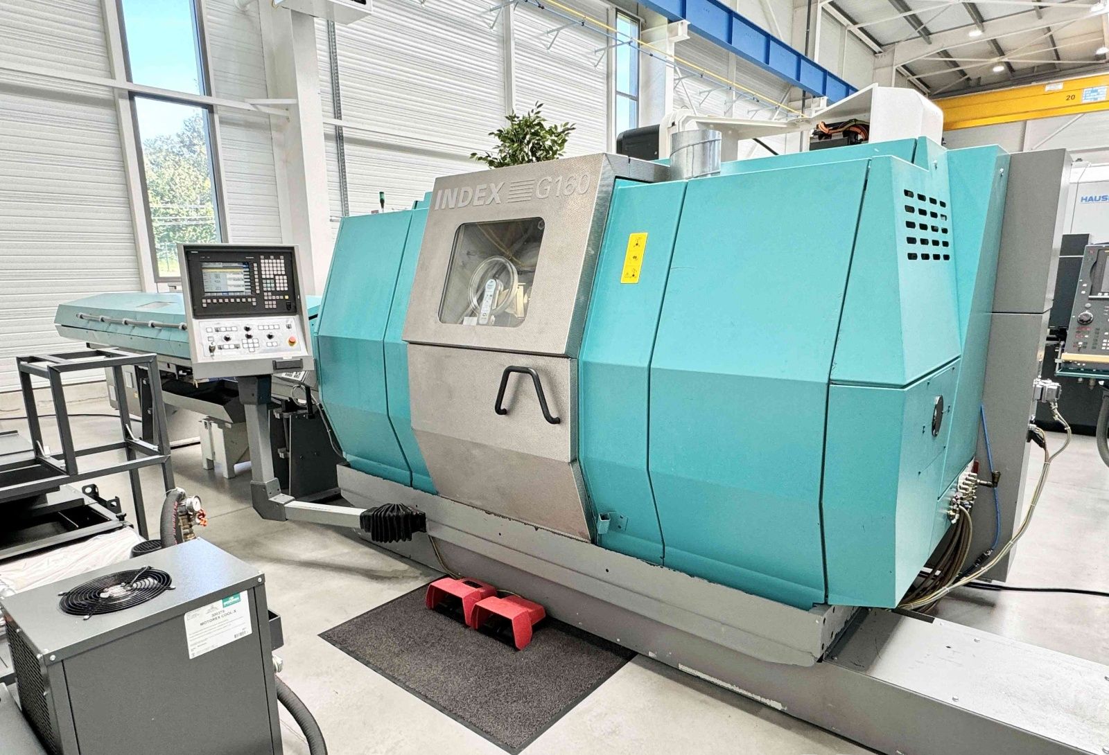 Tour CNC avec ravitailleur de barres INDEX G160 d'occasion