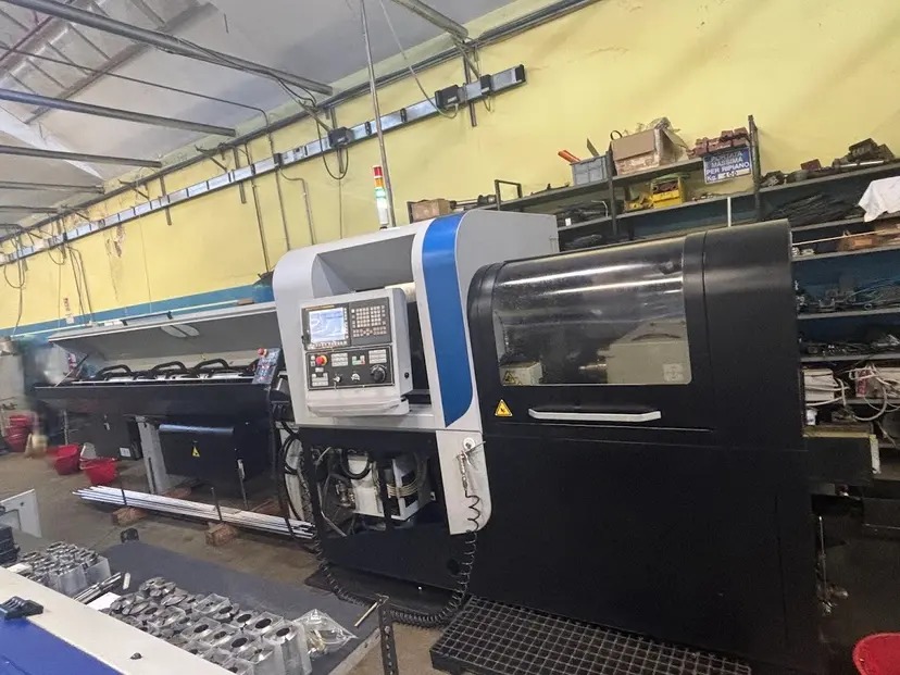 Tour cnc à poupée mobile Tornos GT 32 d'occasion