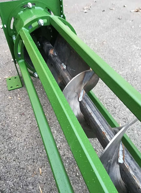 Convoyeur à vis pour copeaux de bois