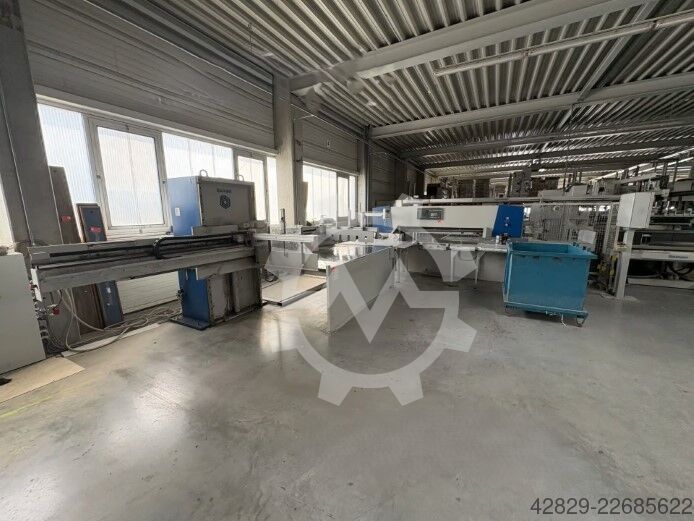 Binder with collating machines Wohlenberg 185