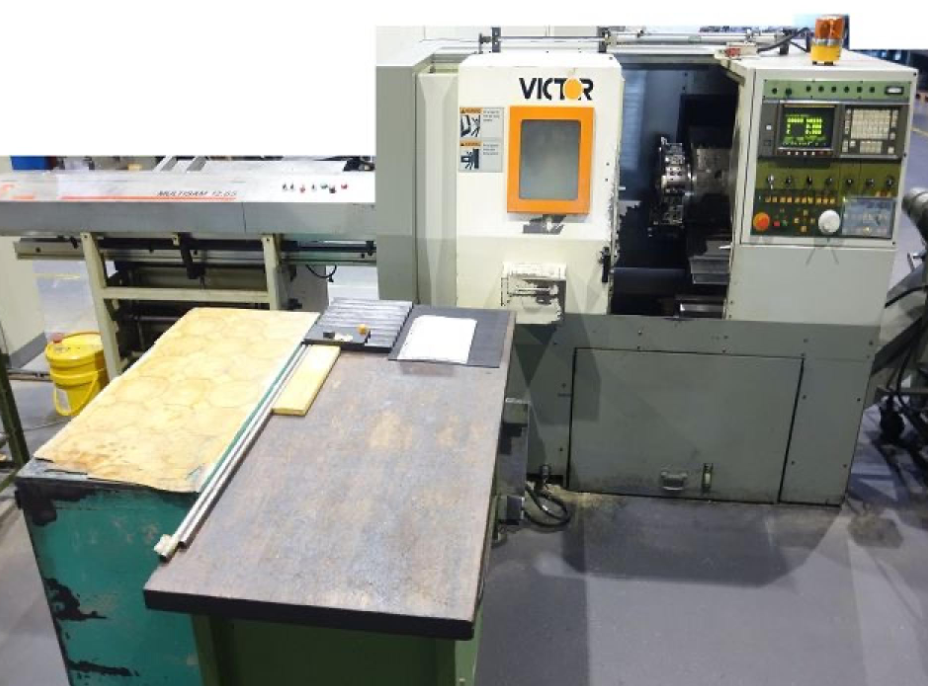 Tour CNC avec ravitailleur de barres VICTOR VT Plus 15 d'occasion