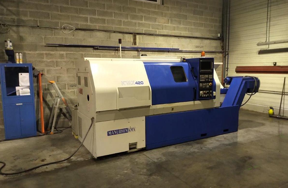 Tour cnc avec outils fixes MANURHIN KMX 420 d'occasion
