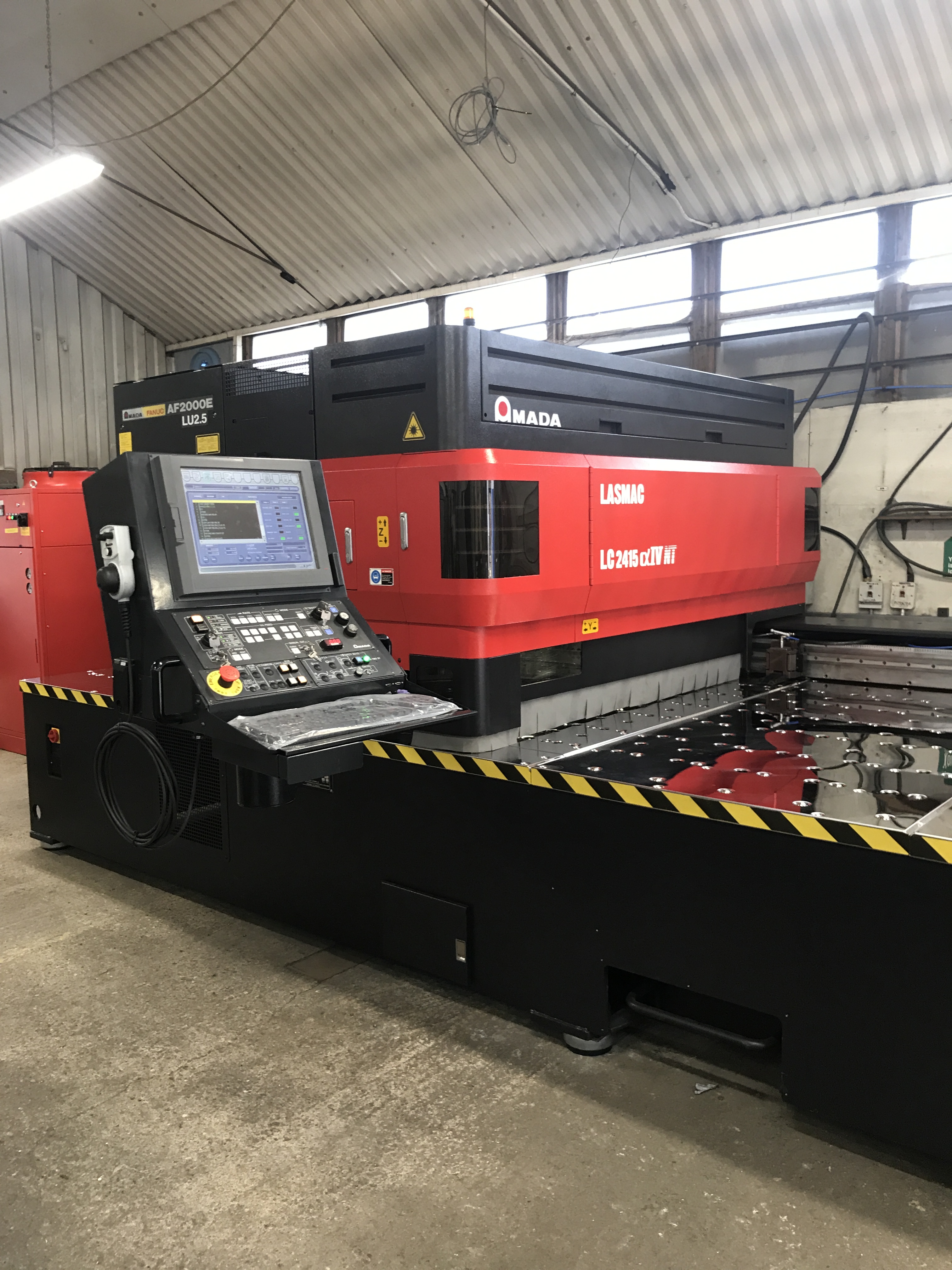 Machine de découpe laser Amada LC2415 Alpha IV