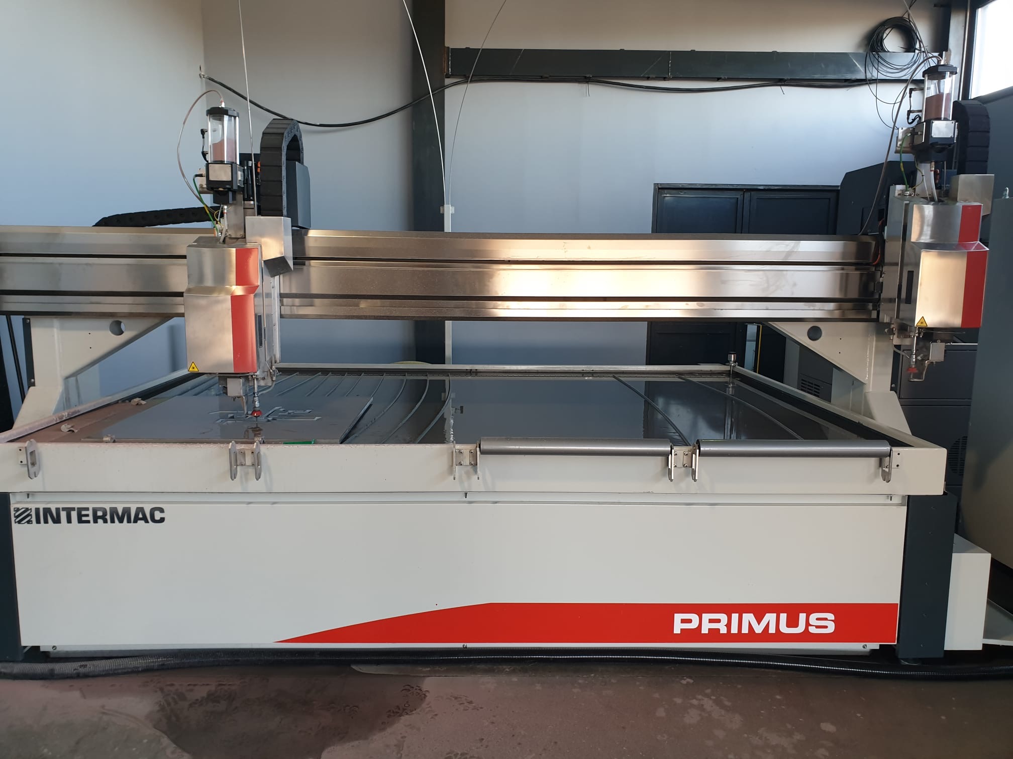 Machine de découpe jet d'eau Intermac / Biesse Primus 322