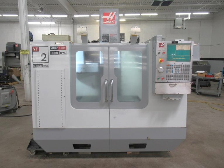 Haas VF2YT 2009 avec course Y étendue, vis sans fin de copeaux, taraudage rigide, boîte de vitesses 2 vitesses, 7500 tr/min, 20 ATC