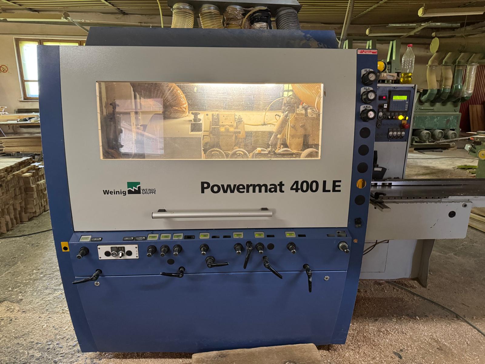 Mouleuse à quatre faces WEINIG POWERMAT 400 LE Table rainurée