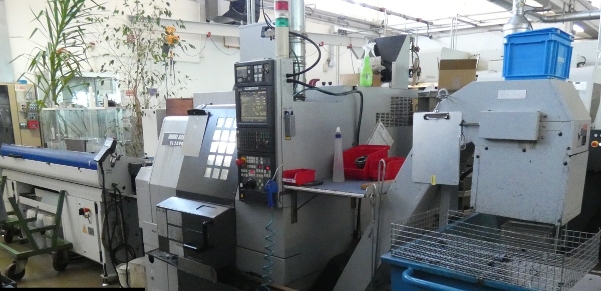 Tour CNC avec ravitailleur de barres Mori Seiki CL 2000 d'occasion