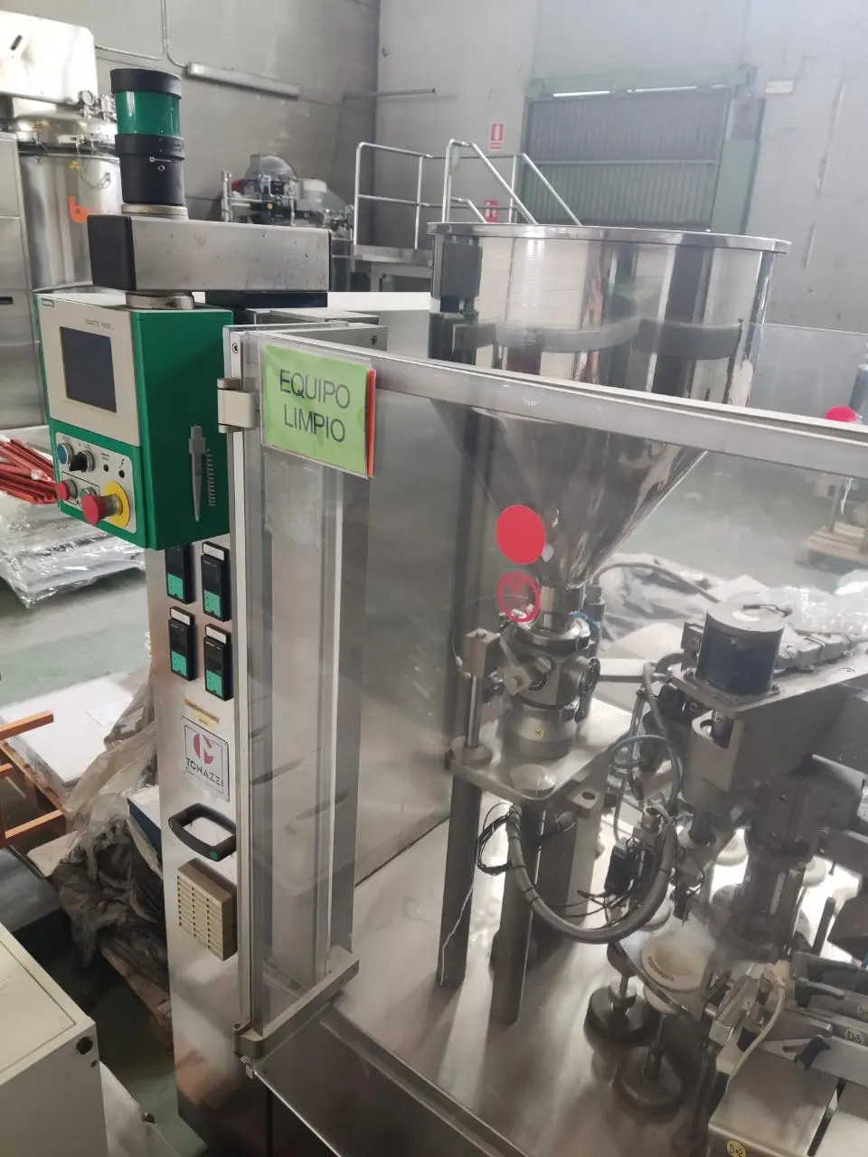 MACHINE DE REMPLISSAGE ET DE FERMETURE DE TUBES TONAZZI COLIBRI 601 D'OCCASION