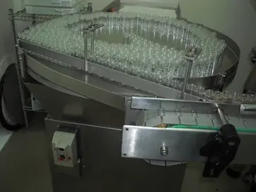 LIGNE DE CONDITIONNEMENT DE FLACONS ET BOUTEILLES HISPAMEC D'OCCASION