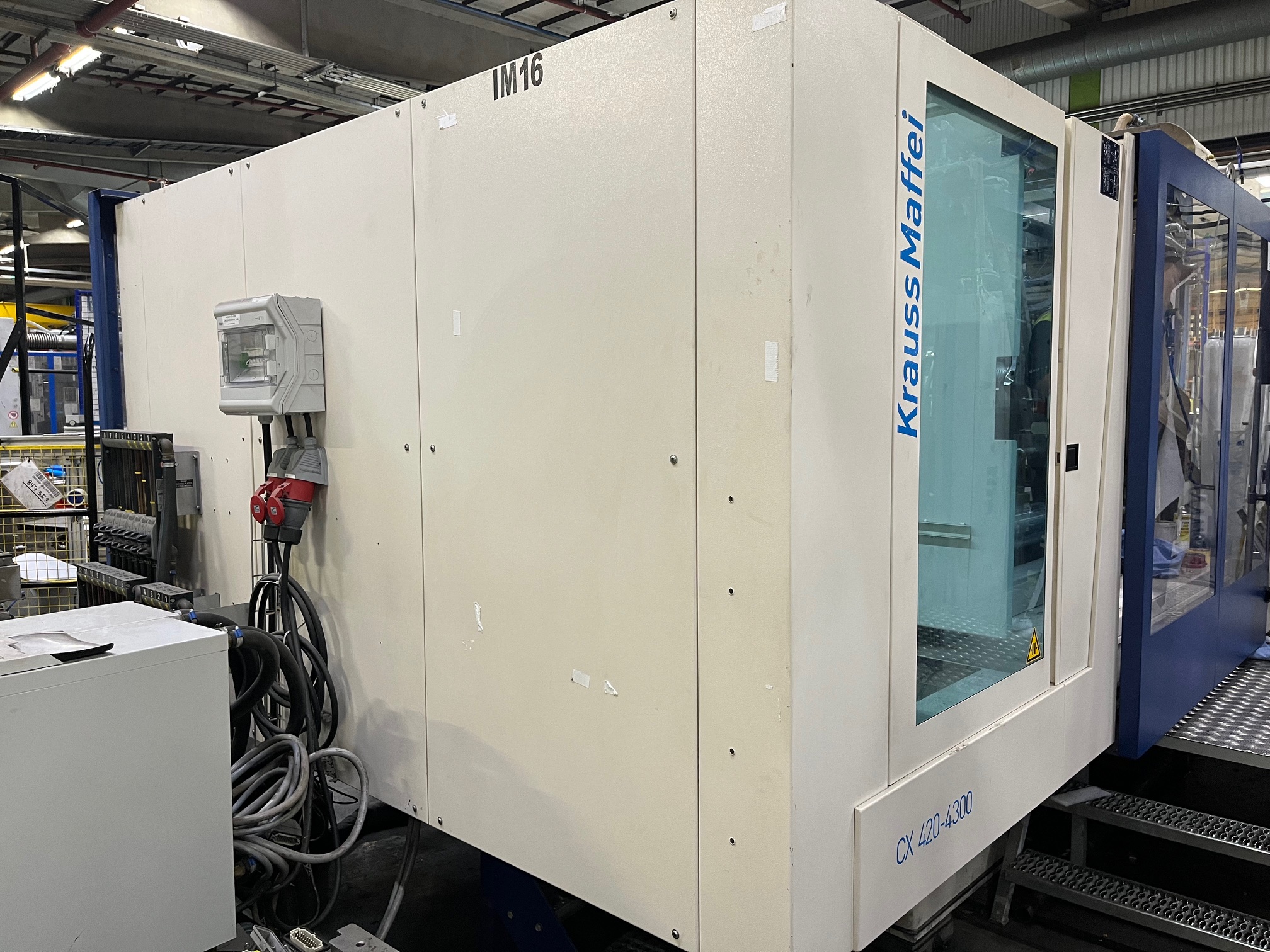 Machine de moulage par injection KRAUSS MAFFEI KM 420-4300 CX