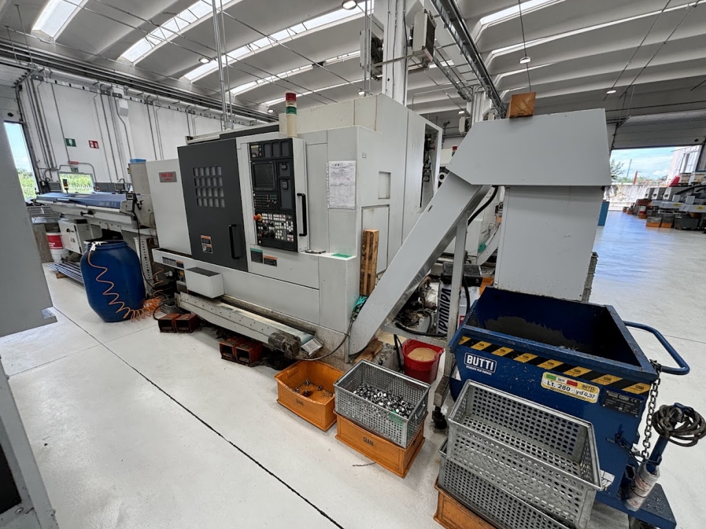 Tour CNC avec ravitailleur de barres Mori Seiki NL 2500 SY 700 d'occasion