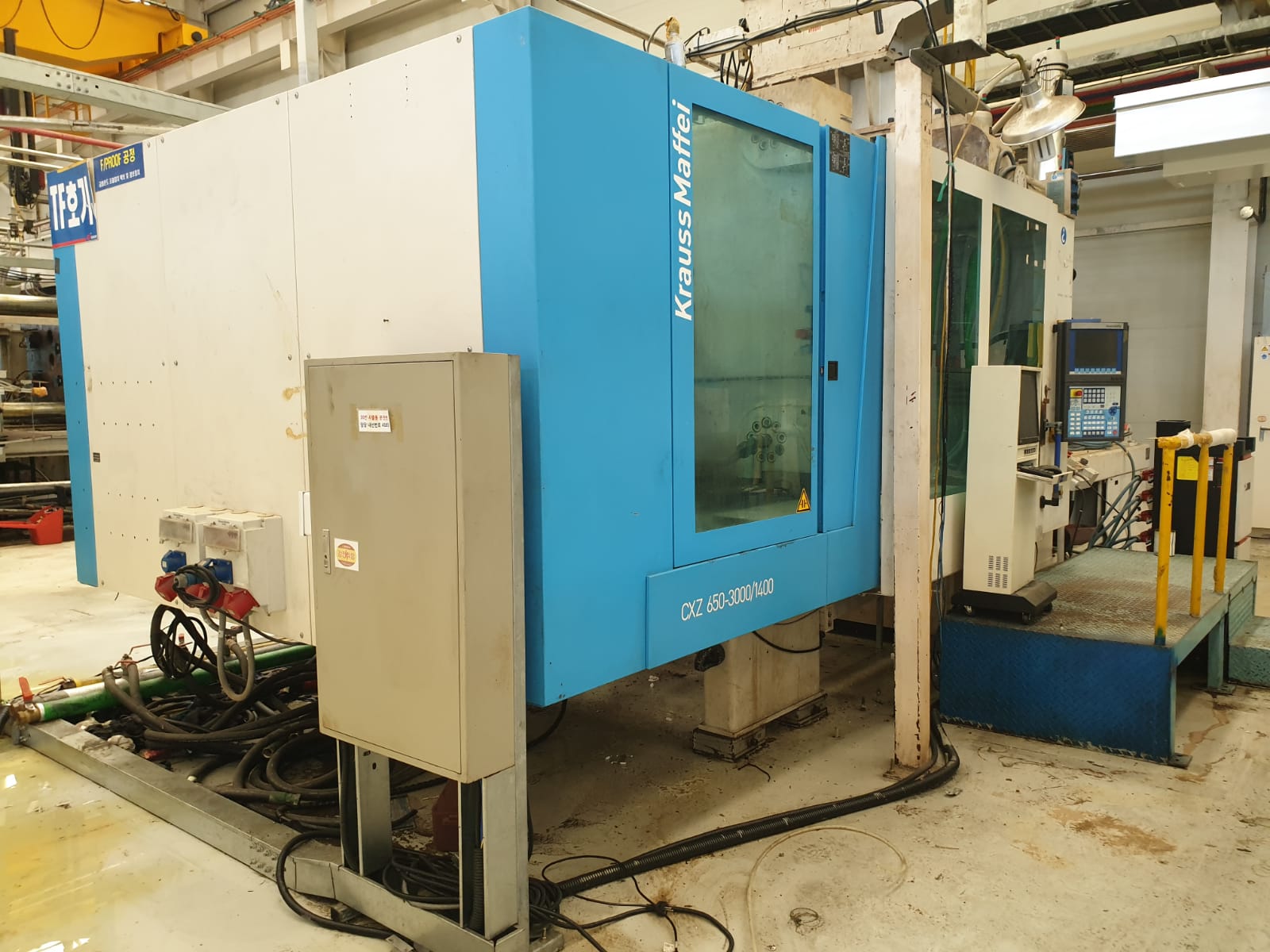 Presse à injecter KRAUSS MAFFEI CXZ 650-3000/1400