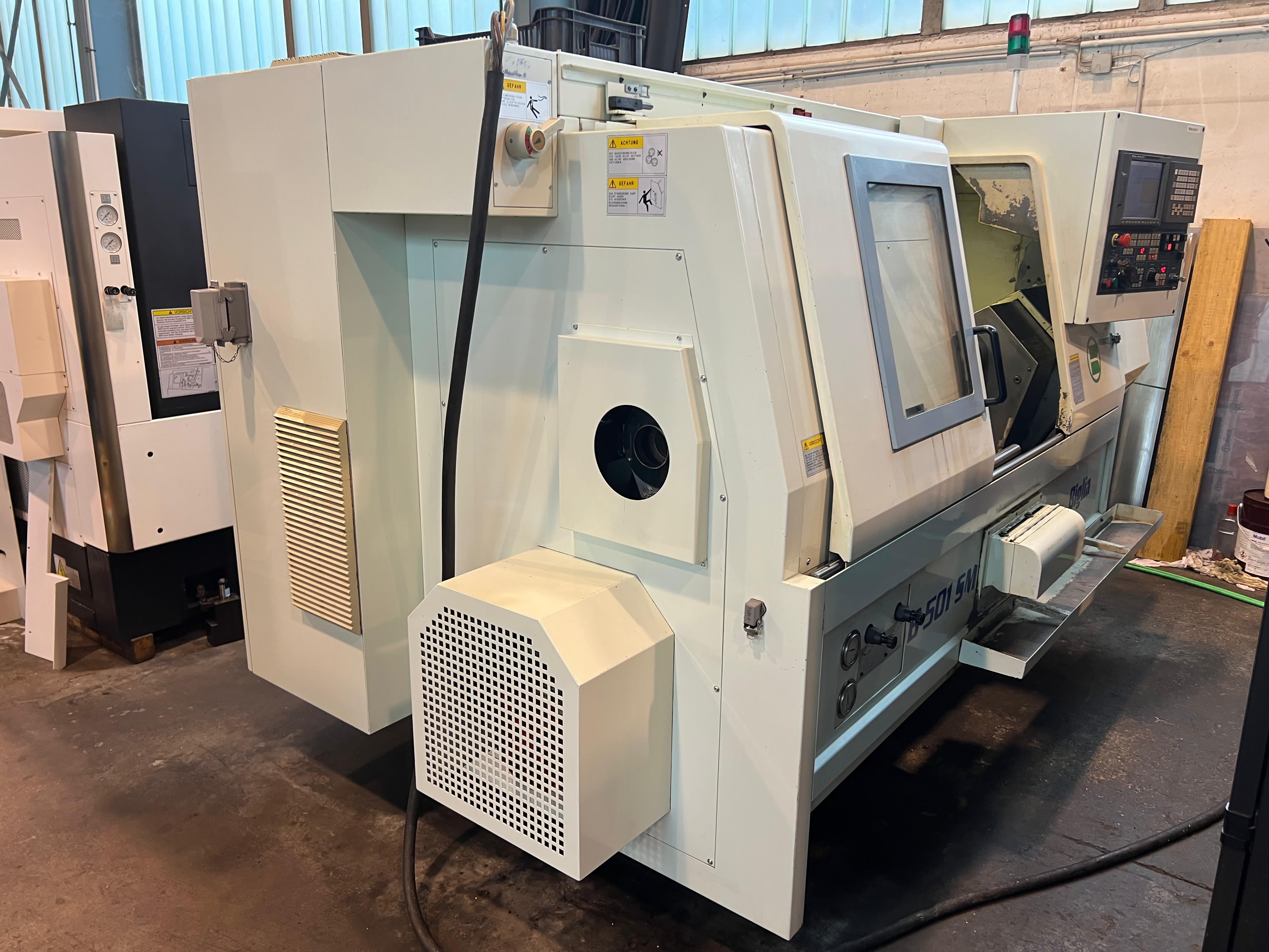 Tour CNC avec ravitailleur de barres Biglia B501 SM d'occasion
