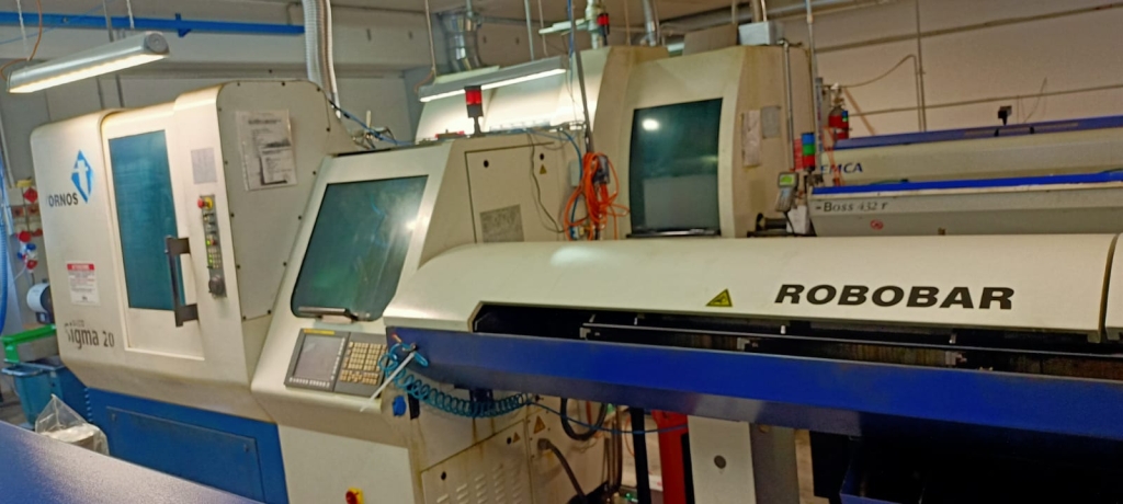 Tour cnc à poupée mobile Tornos Sigma 20 d'occasion